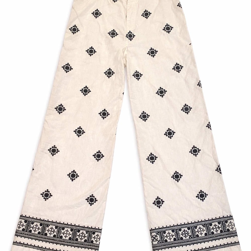 Embroidered White Wide-Leg Pants with Black Motif